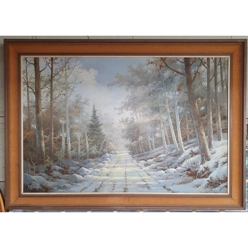 839 - A 20th Century Oil on Canvas of a snowy path in a forest by J Brown in an original frame. Signed LL.... 