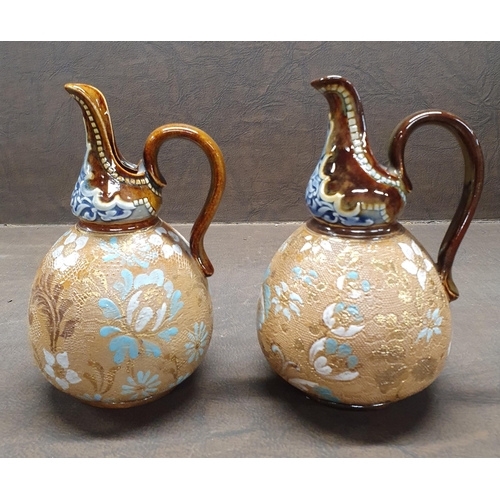 1017 - A good pair of 19th Century Royal Doulton salt glaze Jugs. H 15 cm approx.