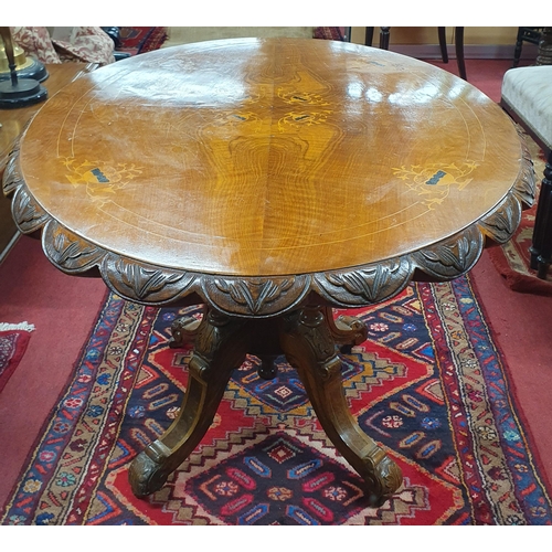 1083 - A 19th Century Walnut oval Supper Table with Inlaid top on quatrefoil base.
H 70 x W 114 x D 82 cm a... 