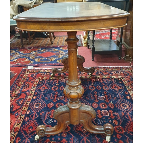 1098 - A lovely mid 19th Century Walnut and Veneered Centre Table with turned splayed supports and stretche... 