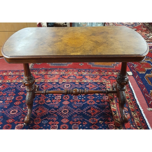 1098 - A lovely mid 19th Century Walnut and Veneered Centre Table with turned splayed supports and stretche... 