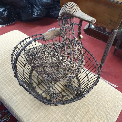 1206 - A metal Basket and Metal figure of a Duck.
H  x W 4 x D  cm approx.