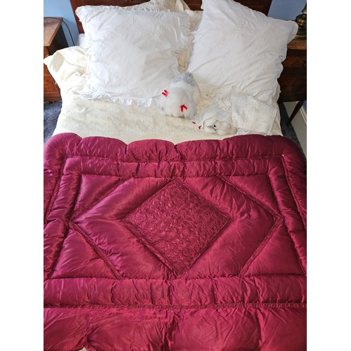 298A - A good Burgundy ground Quilt along with a double bed Duvet and Pillows. 105 x 140 cm wide approx.