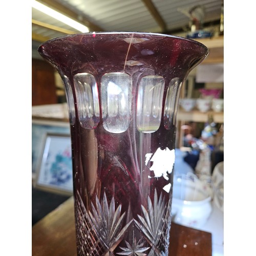 818 - Two 19th Century Cranberry Glass Vases with etched outline. (one with crack). D 14 x H 41 cm approx.