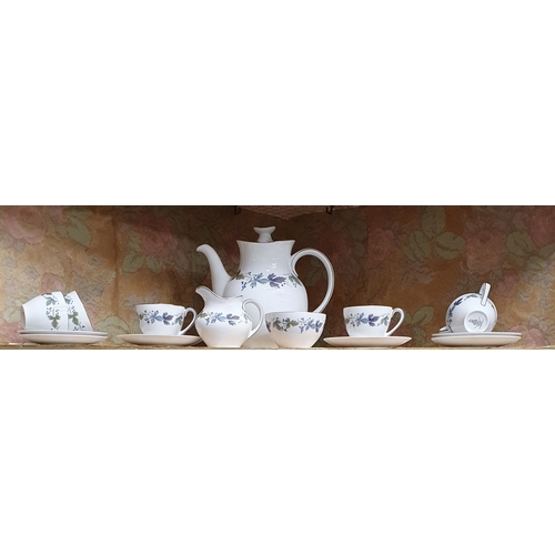 71 - A Royal Doulton burgundy Coffee Set.