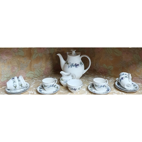 71 - A Royal Doulton burgundy Coffee Set.