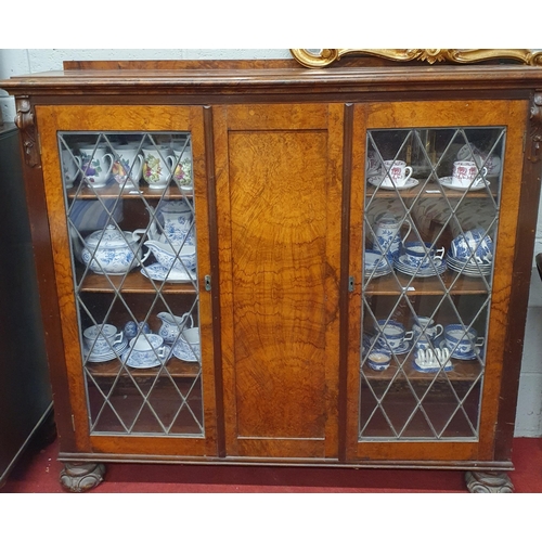 81 - A 19th Century Walnut two door Display Cabinet with glazed leaded panelled doors. 136 x 31 x H 123 c... 