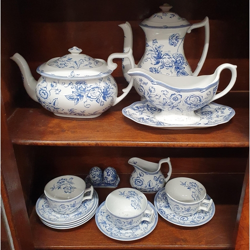 83 - A good quantity of blue and white ground Dinnerwares along with coffee mugs.