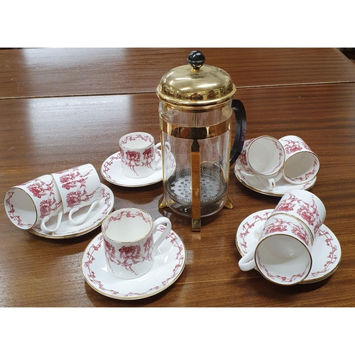 84 - A Sevres style Coffee Set with coffee cans and a plunger.