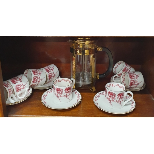 84 - A Sevres style Coffee Set with coffee cans and a plunger.