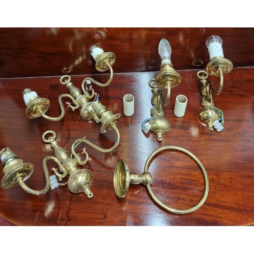 52 - A quantity of Brass wall Lights to include single and twin branch examples.