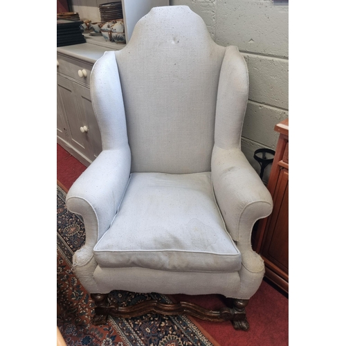 101 - A good 19th Century Wingback Armchair with carved and turned supports. W 76 x BH 113 cm approx.