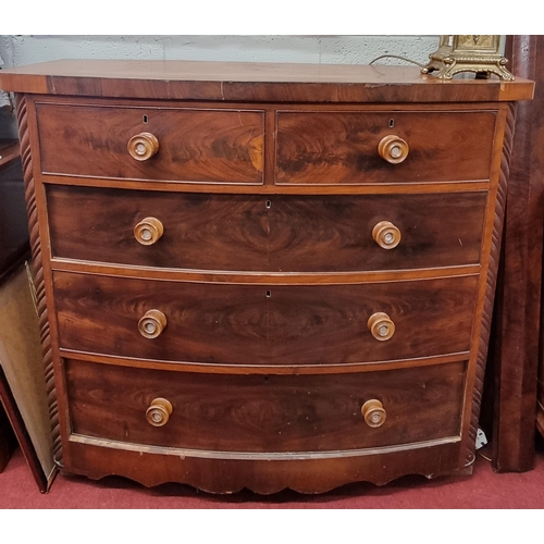 113 - A Victorian Mahogany bow fronted Chest of Drawers with original turned knobs with mother of pearl in... 