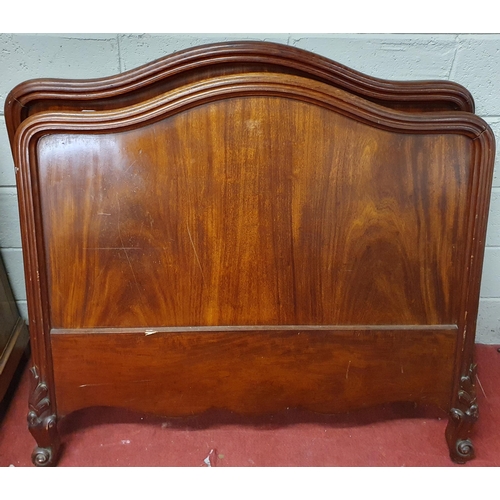 1279 - A 19th Century Rosewood Bed of neat proportions with carved side rails and moulded back.