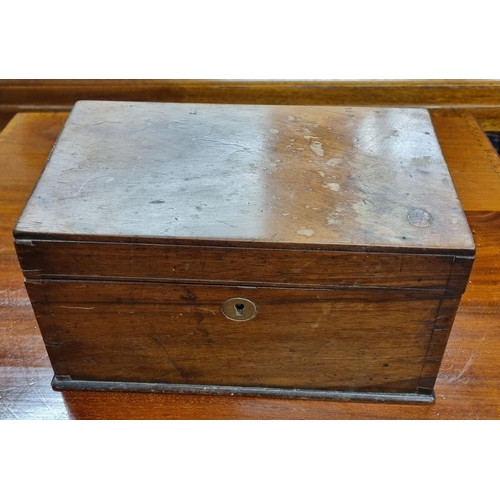 259 - A 19th Century Mahogany Campaign Writing Slope. (lacking interior). 29.5 x 24 x H 15 cm approx along... 