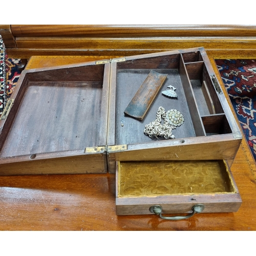 259 - A 19th Century Mahogany Campaign Writing Slope. (lacking interior). 29.5 x 24 x H 15 cm approx along... 