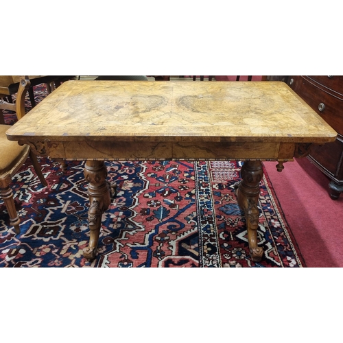 265 - A 19th Century Walnut and inlaid Library Table on carved twin pod supports. 122 x 66 x H 73 cm appro... 