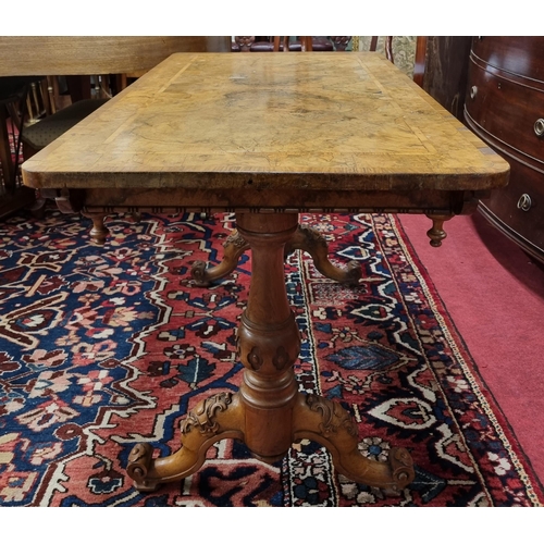 265 - A 19th Century Walnut and inlaid Library Table on carved twin pod supports. 122 x 66 x H 73 cm appro... 