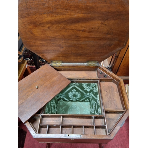 280 - A 19th Century Mahogany Work Table on square tapered splayed supports with octagonal shaped top. 53 ... 