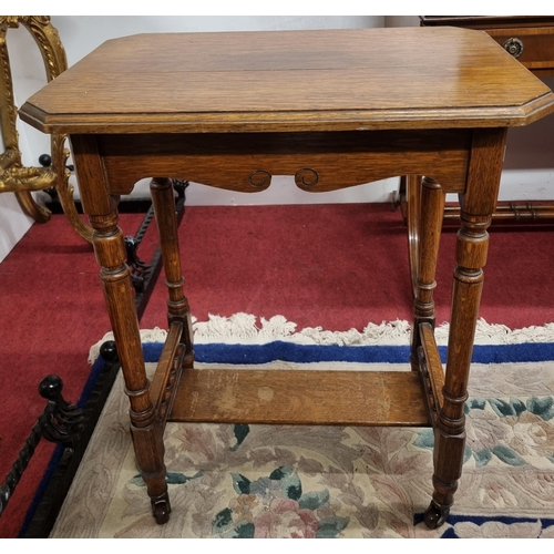 599 - An early 20th Century Oak Side Table on turned supports. 61 x 40 x H 73 cm approx.