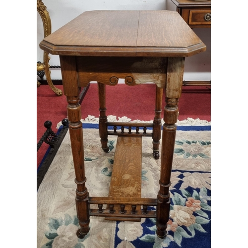 599 - An early 20th Century Oak Side Table on turned supports. 61 x 40 x H 73 cm approx.