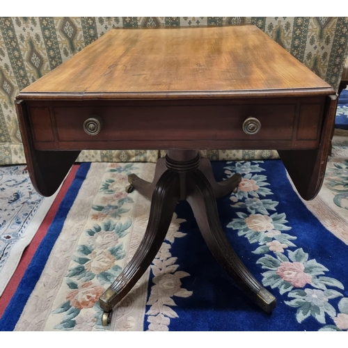 629 - An early 19th Century Mahogany Dropleaf Side Table on quatrefoil supports and brass castors.
 92 x 1... 