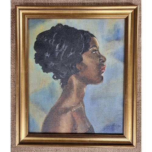 570 - An Oil on Board of a beautiful Woman along with a crayon drawing of a woman. Signed K Laurence.