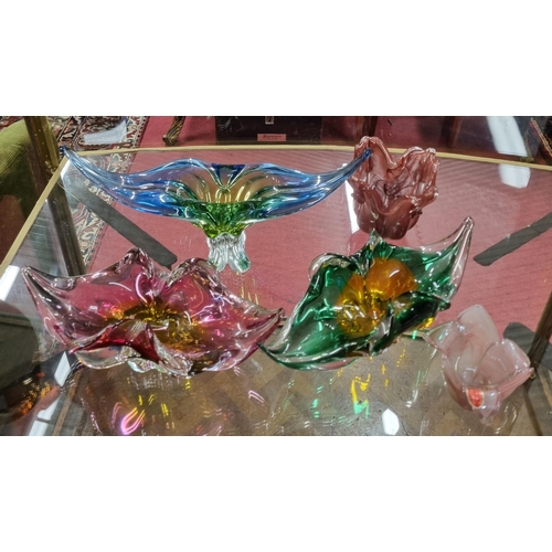 613 - A good quantity of coloured Glass Centre Dishes and others to include Murano.