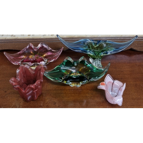 613 - A good quantity of coloured Glass Centre Dishes and others to include Murano.