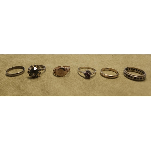 307 - A 9ct Gold and Garnet Ring along with a 9ct Gold wedding Band along with two possibly Gold and two n... 