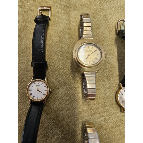 313 - A Tissot ladies Watch, along with a Citizen Watch, two Seiko and a Roamer Watches.