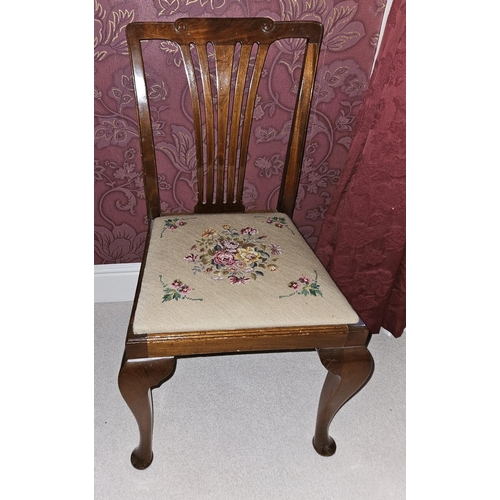 1051 - A good pair of 19th Century slat back Dining Chairs with cabriole supports and tapestry seats.
SH 44... 