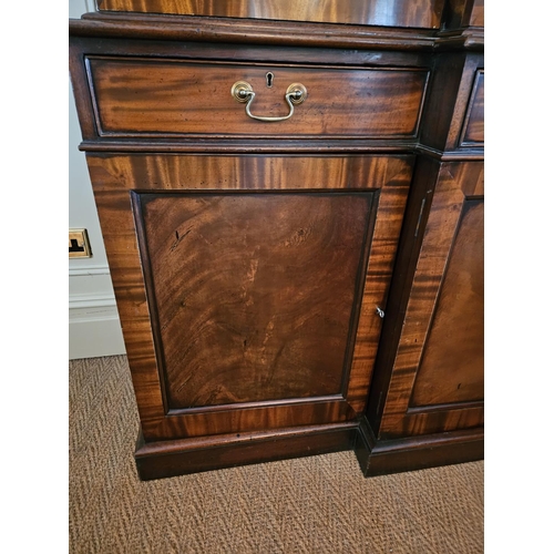 582 - A Magnificent Mahogany four door breakfront Bookcase with frieze drawer moulded centre glazed panel ... 