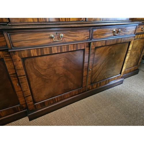 582 - A Magnificent Mahogany four door breakfront Bookcase with frieze drawer moulded centre glazed panel ... 