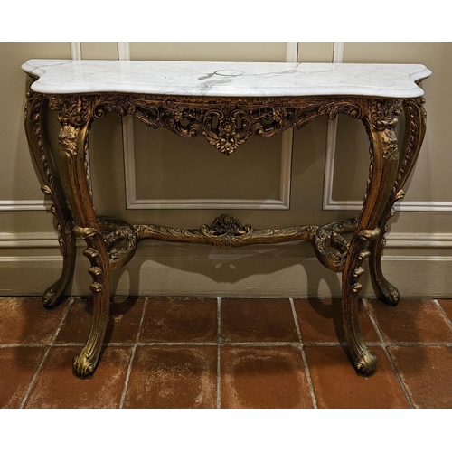 604 - A good serpentine fronted Console Table with marble top and carved plaster gilt cabriole supports. W... 