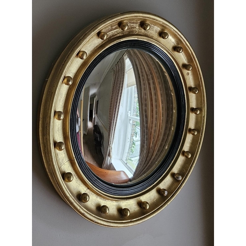 719 - A good early 19th Century Timber and Plaster gilt circular convex Mirror with classical ball design ... 