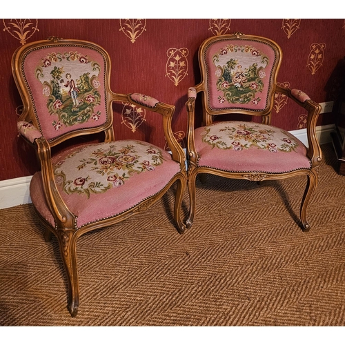 736 - A lovely pair of 20th Century Continental Walnut showframe Armchairs with tapestry upholstered seats... 