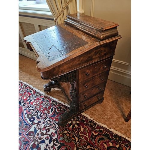 820 - A good 19th Century Walnut Davenport with graduated drawer side and turned front supports on bun fee... 