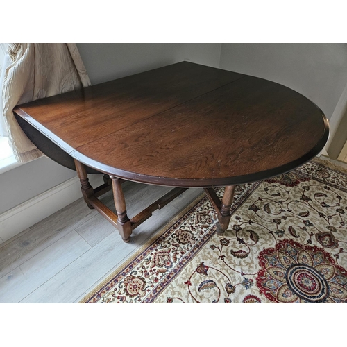 988 - A 20th Century Oak Gateleg dropleaf Table of large size. 120 x 172 x H 74 cm approx.