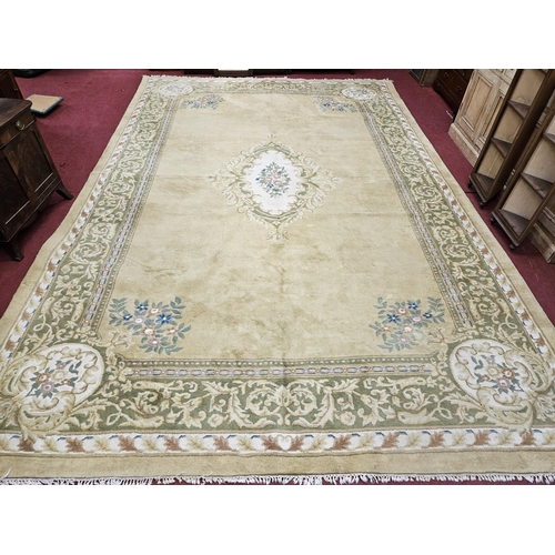 495 - Of Superb quality. A extremely large large cream ground Carpet with a large central medallion design... 