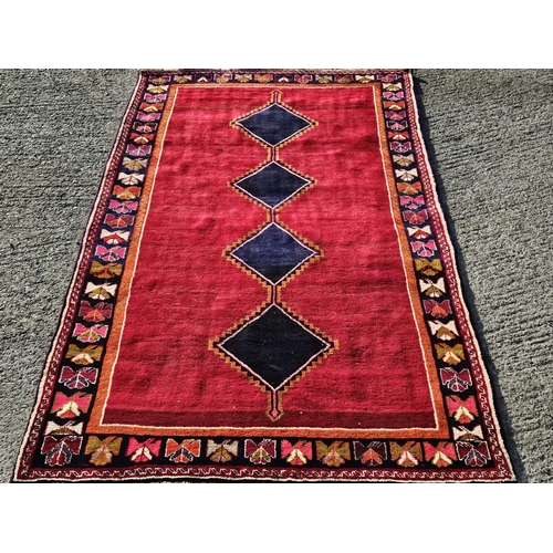 1009 - A thick pile hand woven Persian Gabby Carpet with an all over plain field and diamond medallion desi... 