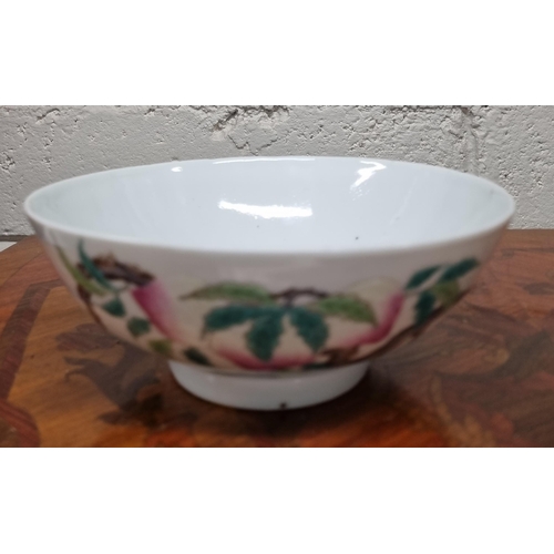 1002 - A good Oriental finger Bowl with floral decoration.
D 15.5 cm approx.