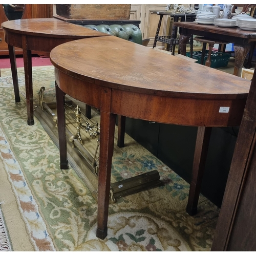 496 - A pair of half moon Georgian Mahogany Side Tables on square tapered supports. W 122 x H 72 cm approx... 