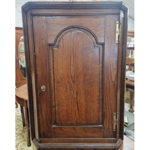 497 - An early 19th Century possibly earlier Oak wall mounted Corner Unit. W 65 x H 90 cm approx.