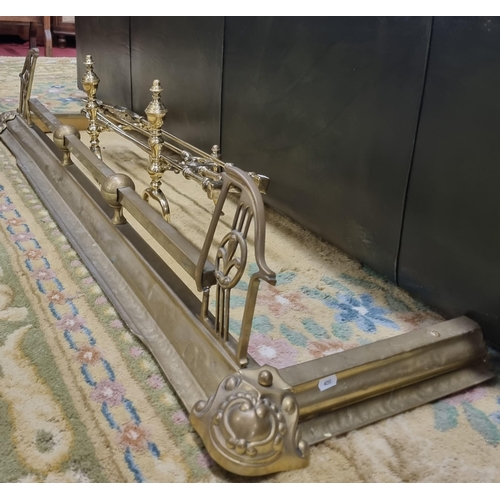 500 - A 19th Century Brass Fender along with a Companion Set and Dogs. Ope 122 cm approx.