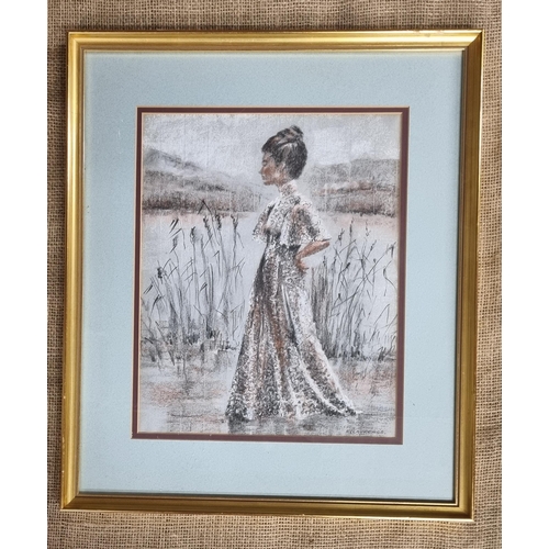 656 - A 20th Century Crayon Drawing of a young woman beside a lake, signed K. Laurence. 36 x 29 cm approx.