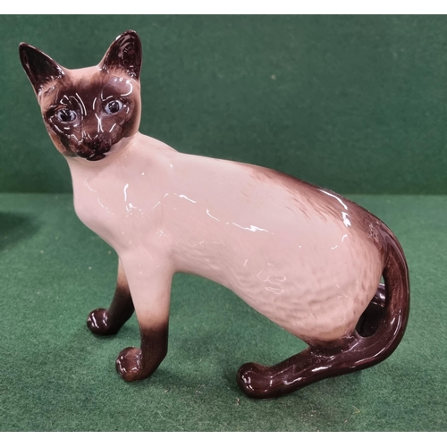 669 - A good quantity of cat Figures to include a large Beswick example.