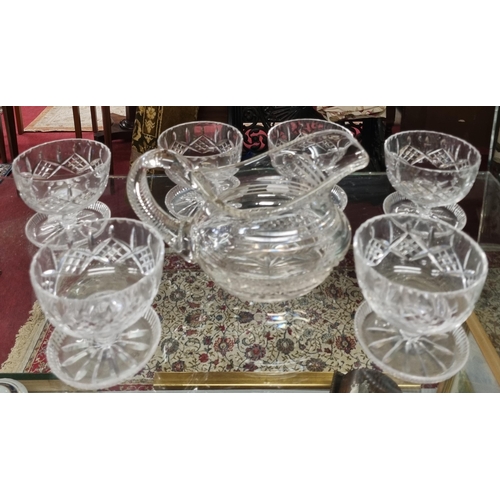 677 - A Waterford Crystal Jug along with a quantity of sundae Dishes.