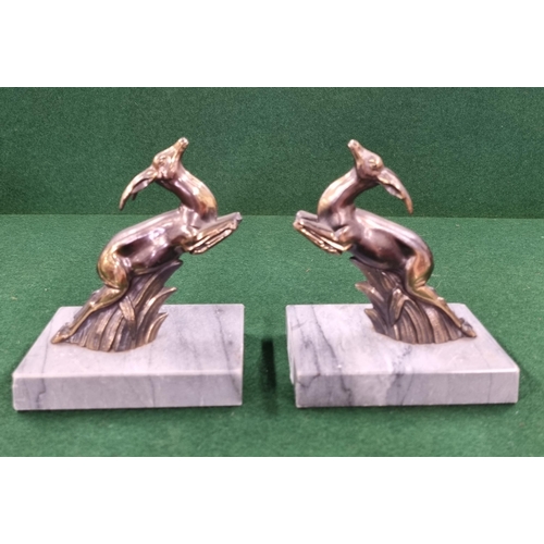 690 - A good pair of mid 20th Century Bookends with bronze leaping deer on marble bases. H 13 cm approx.