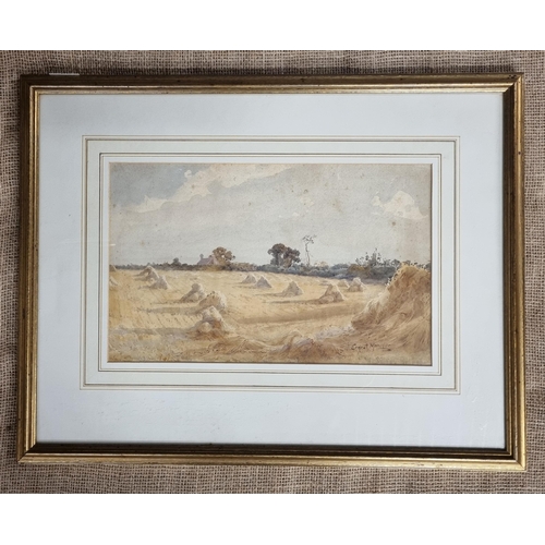 712 - Ernest Mortimer; A 19th Century Watercolour of a harvest scene with stooks of hay in a field and hou... 